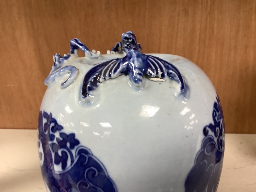 A Chinese blue ground blue and white dragon design vase, 17cm high